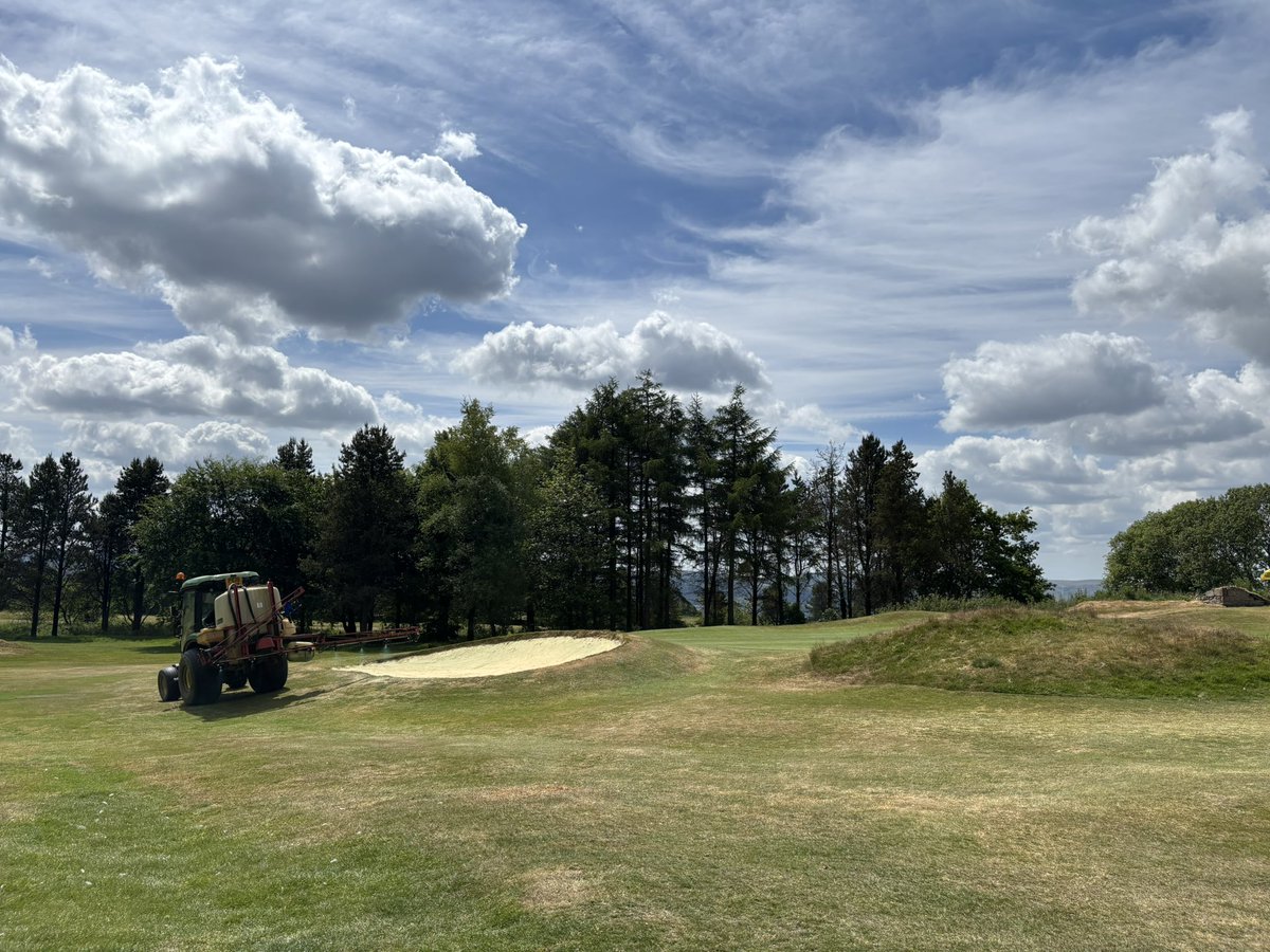 Wetting agent applied to the tees and some localised dry areas ahead of this evenings rain.