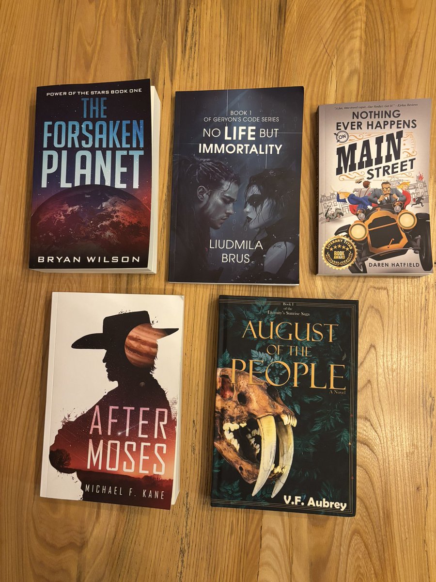 TheTomeTavern's tweet photo. I went a little crazy with the Sci-Fi. Looks like I have my lineup for the foreseeable future. Amazing bookmail day! https://t.co/OcqscDsxr2