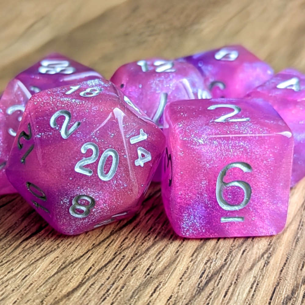 The perfect blend of pink and purple, these dice sparkle with a stardust glow, ready to light up your game.

🎲 Check them out here - dicedragons.co.uk/products/lilac…

#dicedragon #dungeonsanddragons #dicegoblin #dnddice #diceset #dice #ttrpgdice #ttrpg #dnd #dnd5e #tabletop #diceshop