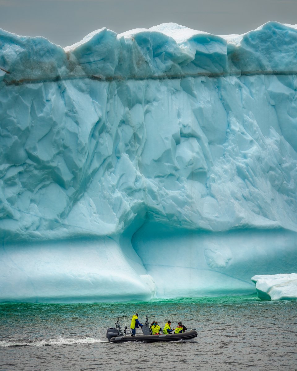 A Zodiac viewing the full height of an iceberg on Twillingate Island Newfoundland. It gives one a sense of how large these things are. Have you had a chance to see an iceberg this year?