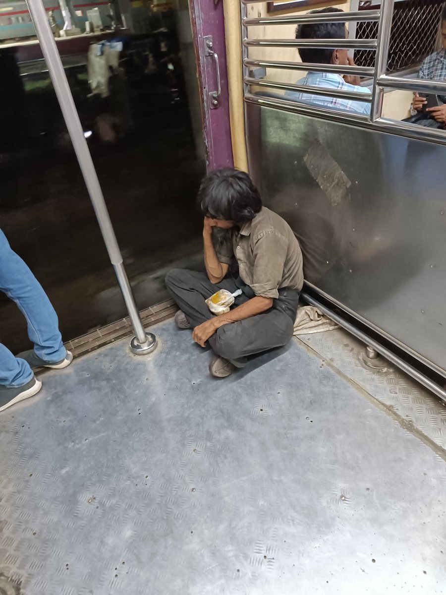 lo_omkar's tweet photo. @Central_Railway Travelling free of cost in 1st class and creating hindrance to ticketed passengers https://t.co/sR1MHq7jQq