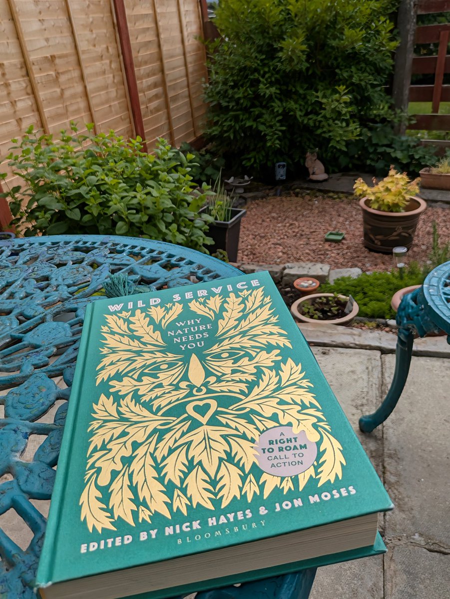Making the most of the cooler air between showers to read outside. The birds and bees are a welcome distraction too. #natureismytherapy