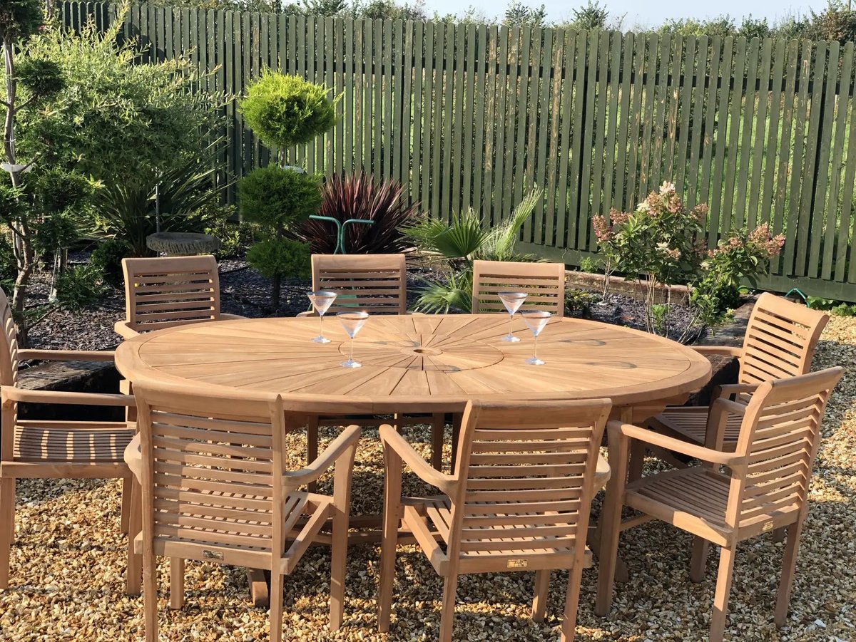 SPECIAL BANK HOLIDAY OFFER - SUPERB VALUE &amp; INVESTMENT.Premium Kiln dried Teak Oval Table with 8 Teak Stacking Chairs.Table size: 220cm x 140cm  x 76cm. 4cm table top depth mortice &amp; tenon joints. Smoothly sanded for optimum appearance. Prompt free delivery £1595.