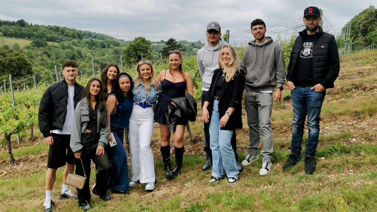 Friends celebrate Kayleigh's birthday with picnic and bubbles in the vineyard.