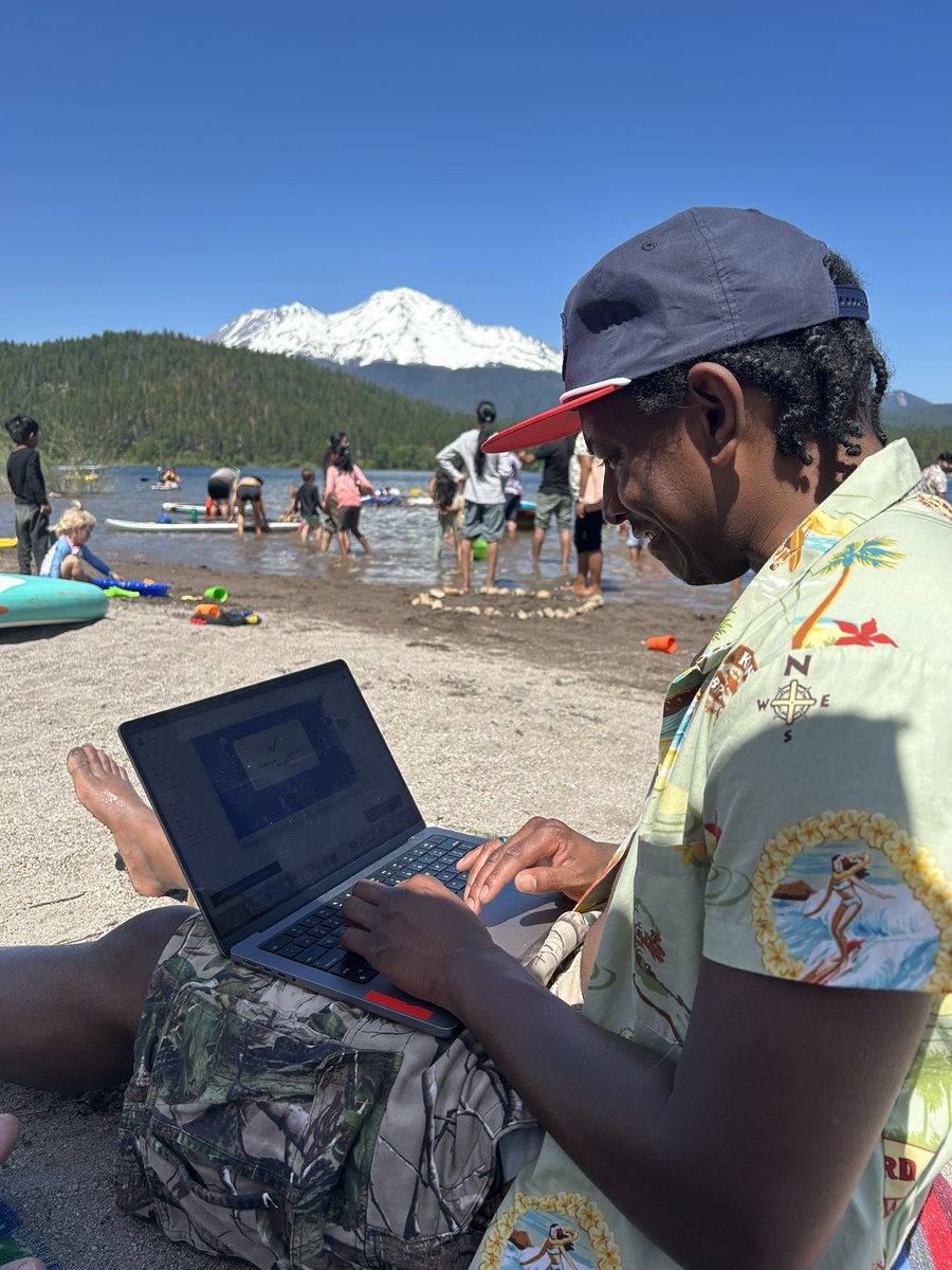 he said ‘touch grass’ so bro brought his laptop to the sand.