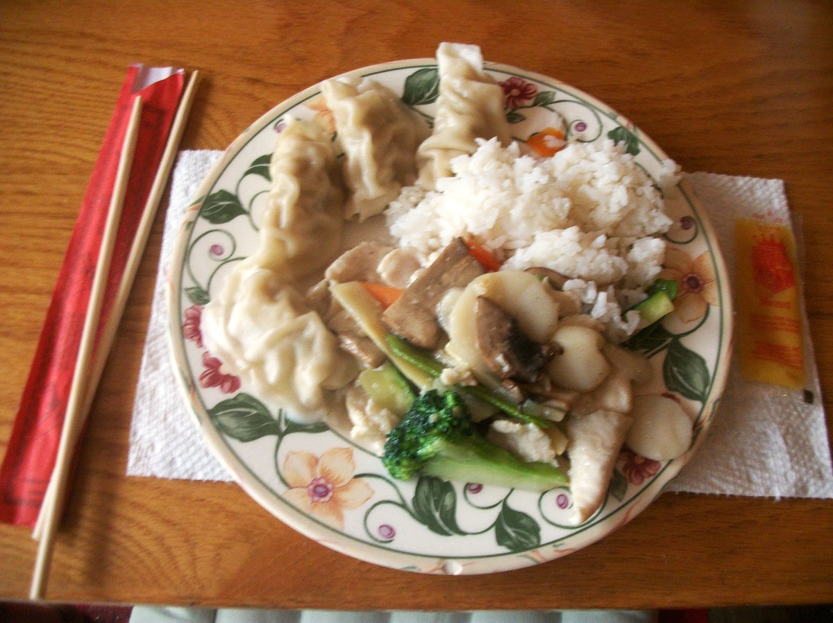 We got Chinese to go tonight from Chef Wong's Place, Chinese Veggies with Chicken in a white sauce with steam dumplings