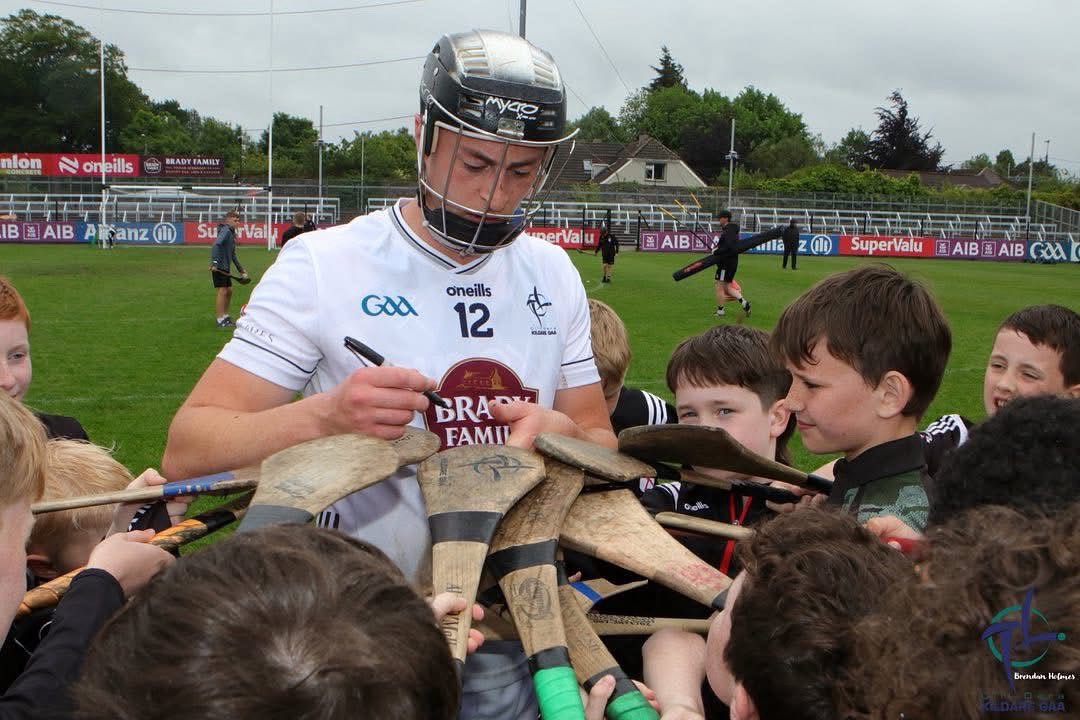David Qualter signing Hurls for Kildare supporters after yesterday fantastic victory over Down. 

Photo credit Brendan Holmes