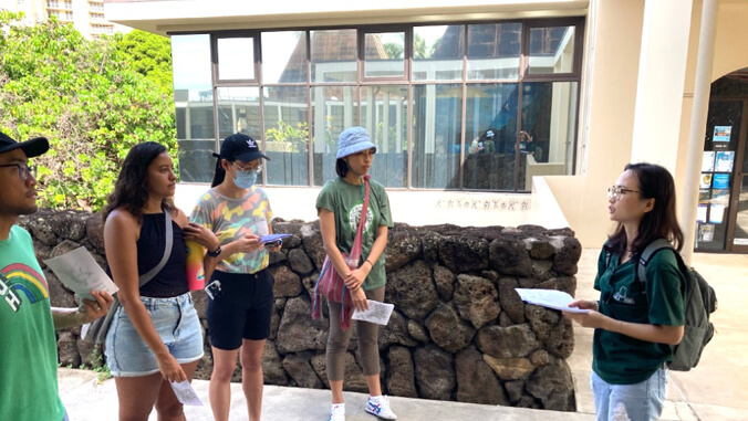 uhmanoa's tweet photo. The “Remapping UH Mānoa: A Campus Huakaʻi” tour invites students, faculty, and visitors to explore the campus through Hawaiian land divisions, uncovering stories of geography, language, resilience, and renewal ➡️ https://t.co/hQ8nj3e7kQ #ExploreUHM https://t.co/LhdSwjjd7H