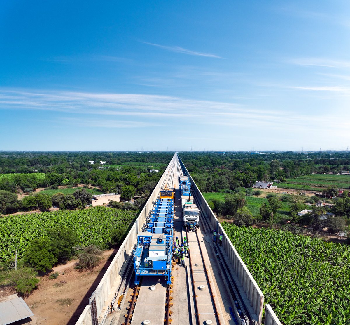 Powering ahead with seamless coordination, track construction on the #MAHSR corridor is underway in Vadodara, Gujarat. Track slabs are being placed, followed by cement asphalt mortar injection, laying the groundwork for high-speed excellence.