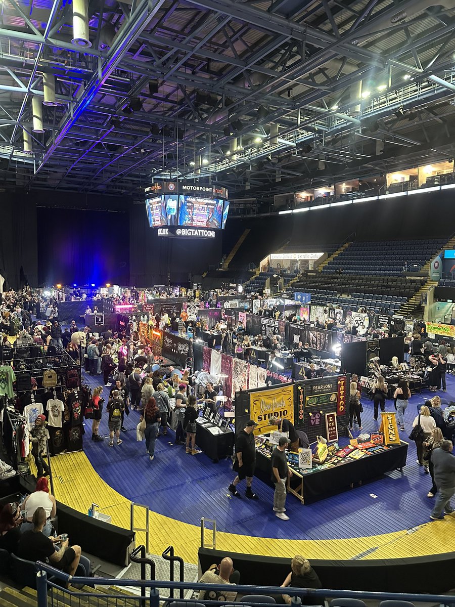 We are at Big Tattoo Meltdown at the motorpoint arena again today . Come say hi and get tattooed on the ice under our overlord-  The Jumbotron