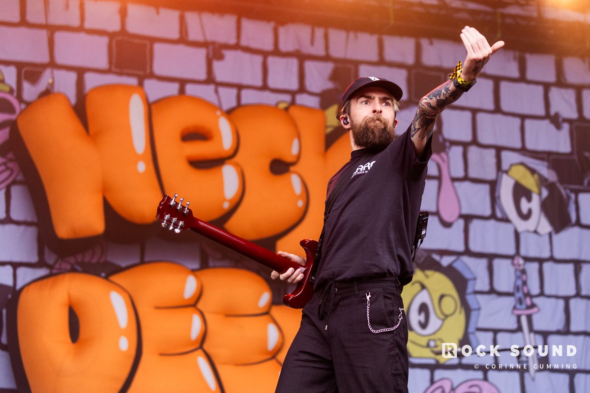 rocksound's tweet photo. Neck Deep, Slam Dunk Festival 2025

REVIEW: The connection that Neck Deep and Slam Dunk share runs deep. From first being voted onto the line-up back in 2013 to becoming mainstays of the festival’s main stage, making sure to dominate every other stage on their way up, too, they are a testament to where hard work, determination and passion-fueled tenacity can take you. Yet despite their previous victories already etched into the history books, something about today feels even more ultimate. A graduation to an even higher place. The selection of underdog anthems they have at their disposal, from a buoyant ‘Motion Sickness’ to a spirited ‘Can’t Kick Up The Roots’, are now definitive pop-punk classics. Freshly baked banger ‘You Should See Me Now’ is already being received like an old friend, ‘She’s A God’ and ‘Lowlife’ continue to demonstrate how far the band’s wings can scratch and the mayhem that accompanies ‘Kali Ma’ and ‘Gold Steps’ is still as marvellous to behold as it was a decade ago. Though it’s ‘A Part Of Me’ that, 13 years after its viral debut, remains the measuring stick for how massive this has all become. From their bedrooms in Wrexham to the very forefront of the genre they adore so much, the volume of the sing-along that accompanies it alone is enough to get you a touch choked up. It perfectly sums up a powerful, pride-filled display that further cements Neck Deep’s place at the top of the ladder. Future headliner? Without a shadow of a doubt.

✏️ Jack Rogers 
📷 Corinne Cumming