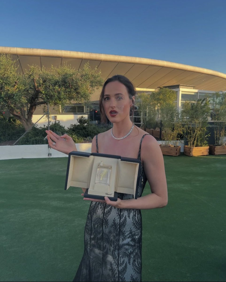 Renate Reinsve stuns holding the Cannes Grand Prix.