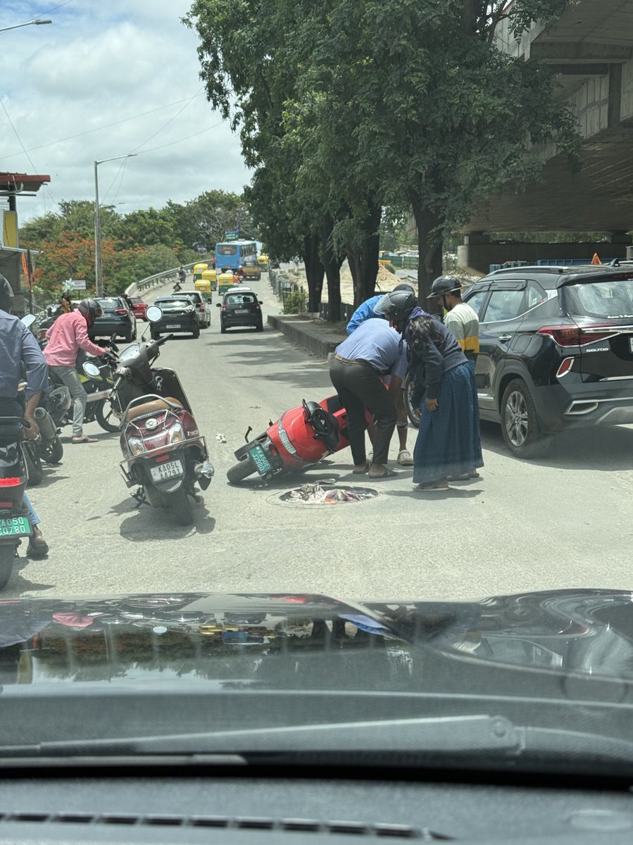 Pradeep Soundararajan (@testertested) on Twitter photo A couple fell down in this pot hole today near PES college near nice road entry. Help my road tax money save people Mr <a href="/DKShivakumar/">DK Shivakumar</a> 🙏
Details: A car ahead of them blocked their view of the existence of pot hole. When the car moved they moved and then they fell. Sad! A couple fell down in this pot hole today near PES college near nice road entry. Help my road tax money save people Mr <a href="/DKShivakumar/">DK Shivakumar</a> 🙏
Details: A car ahead of them blocked their view of the existence of pot hole. When the car moved they moved and then they fell. Sad!