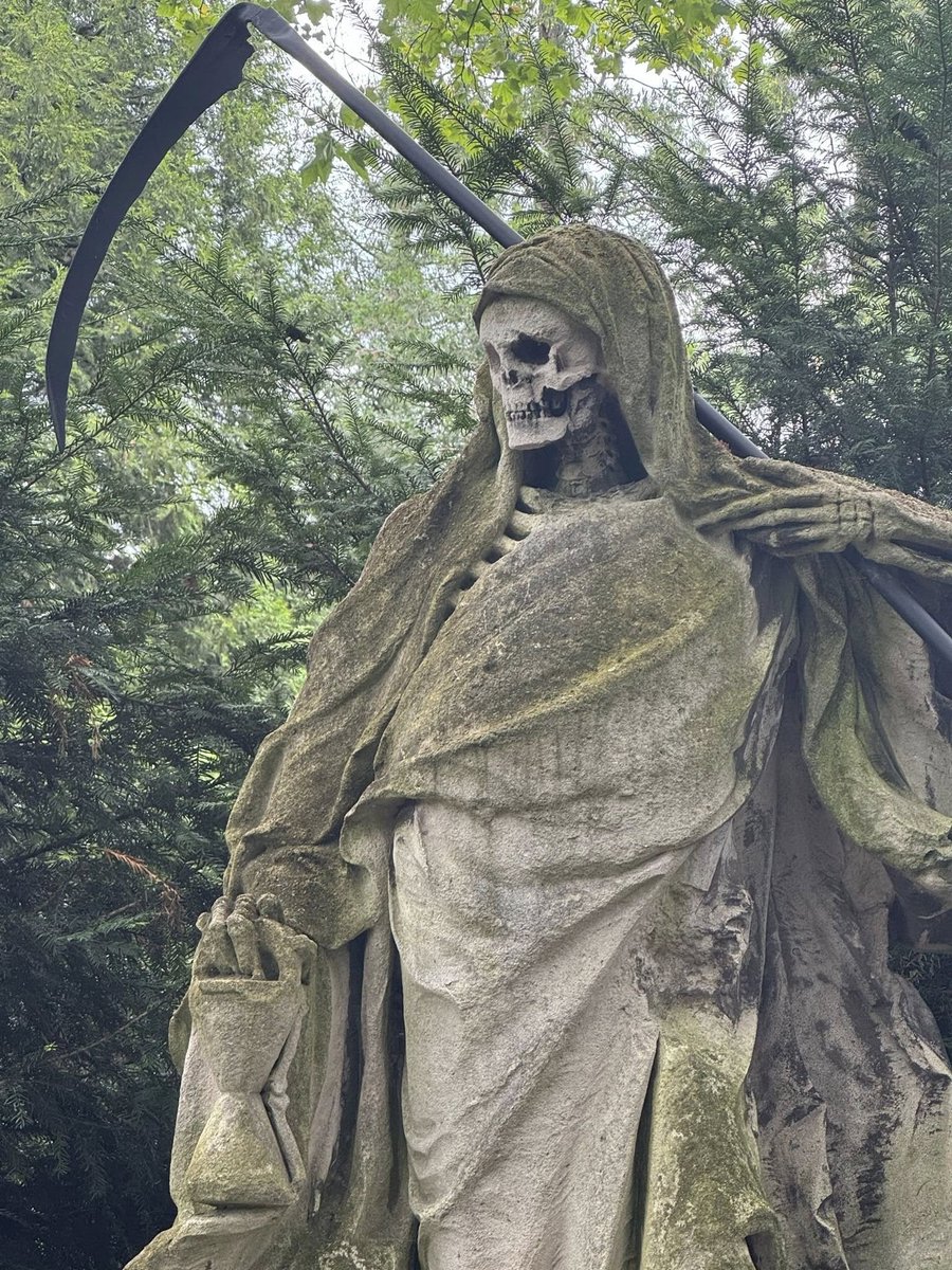 Grim reaper, Melaten Cemetery, Cologne, Germany.