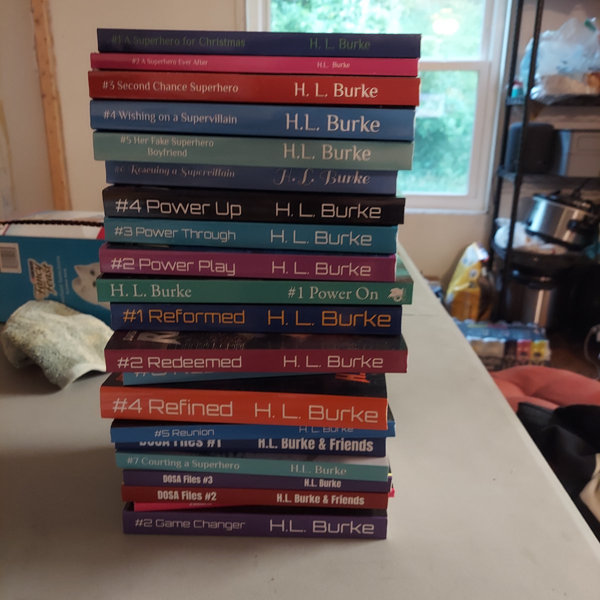 hlburkewriter's tweet image. Shout out to the Kickstarter backer who selected pretty much every paperback add-on option for the recent #DOSAFiles Kickstarter and will be getting this massive stack of books (probably in the next few days. I shipped it last week) #bookstack