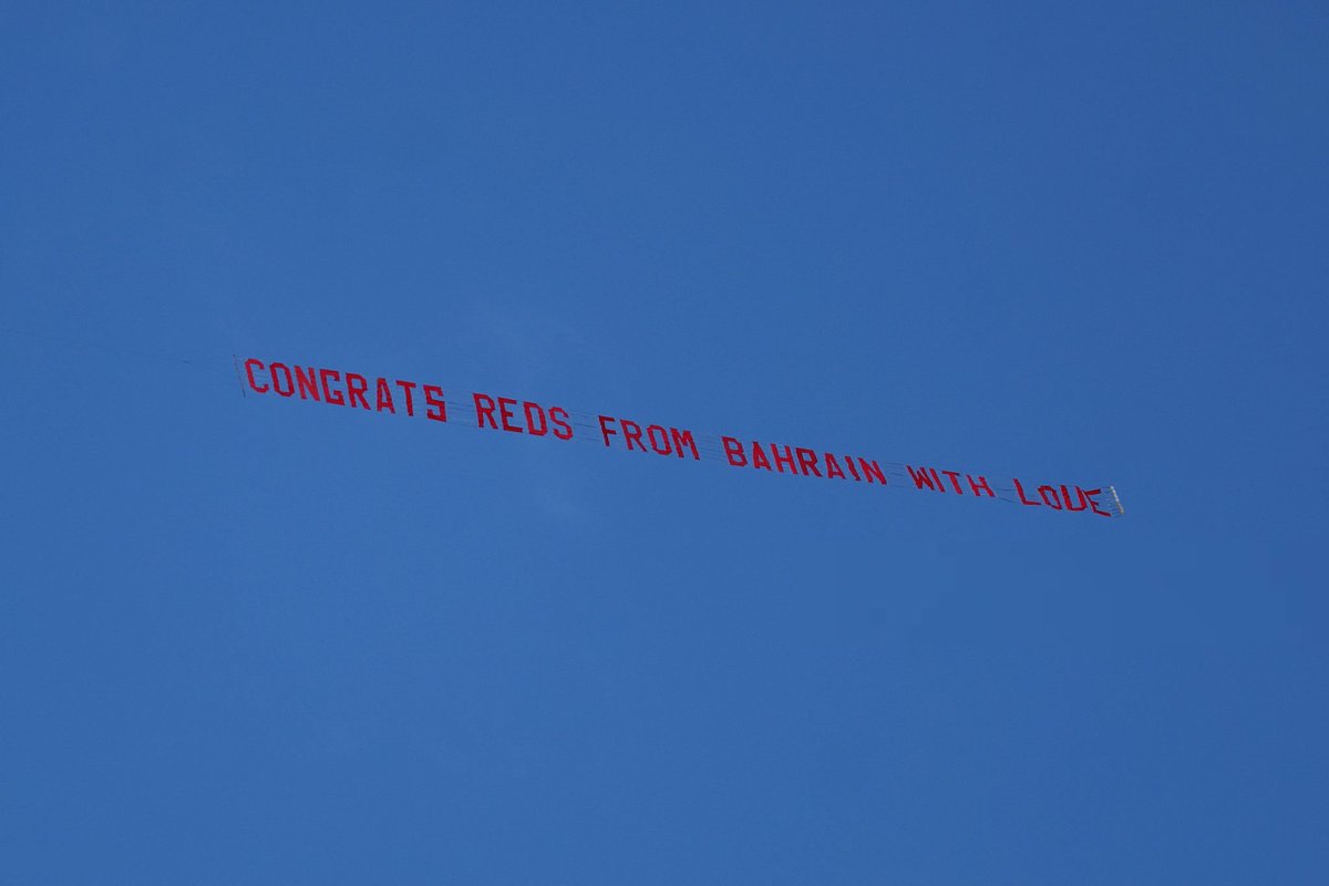 HQpcrt's tweet photo. flys over Anfield flying a banner which reads "Congrats Reds From Bahrain With Love" #LFCChampions https://t.co/OQU2Y9k0Lb
