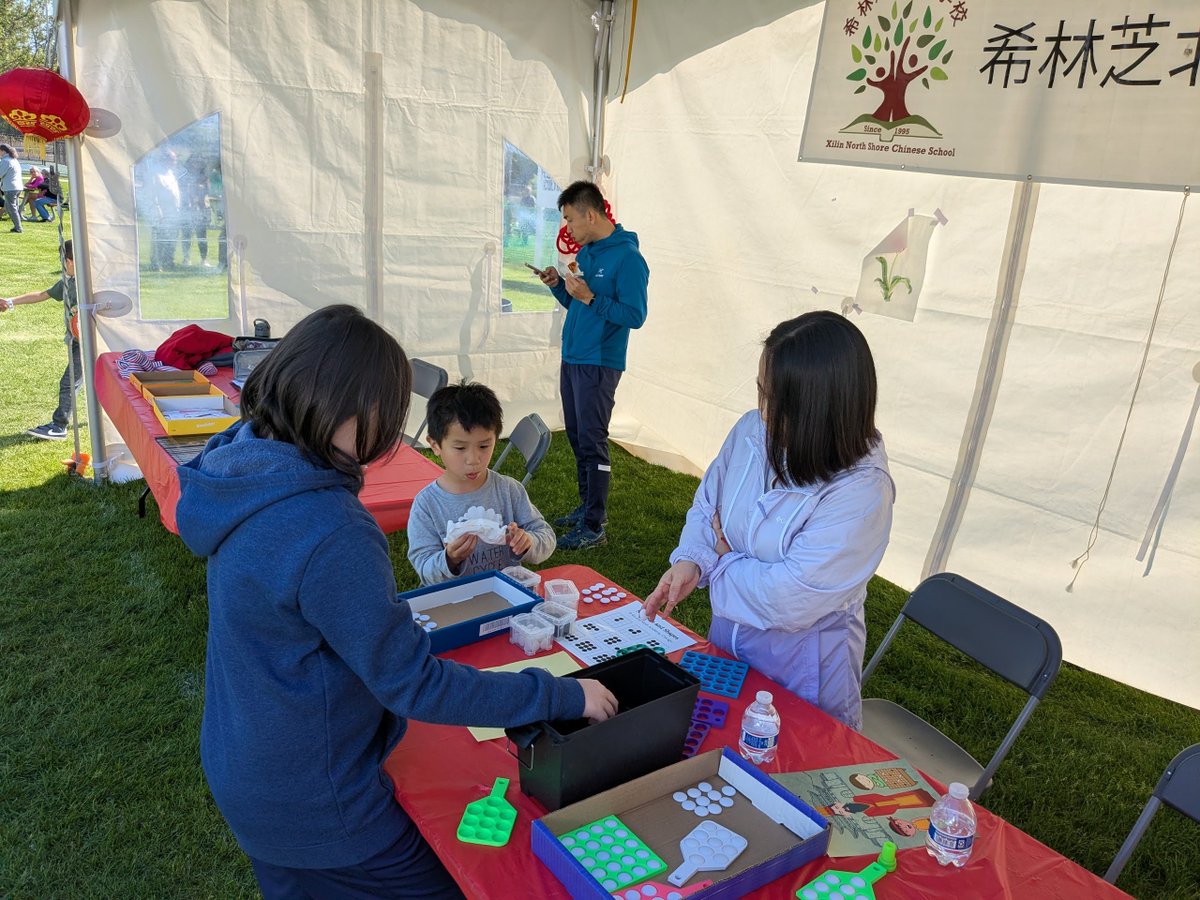 goandmath's tweet image. Visitors at the Skokie Cultural Festival had a chance to learn the ancient and strategic game of Go! Great to see curiosity and smiles as people discovered this timeless board game