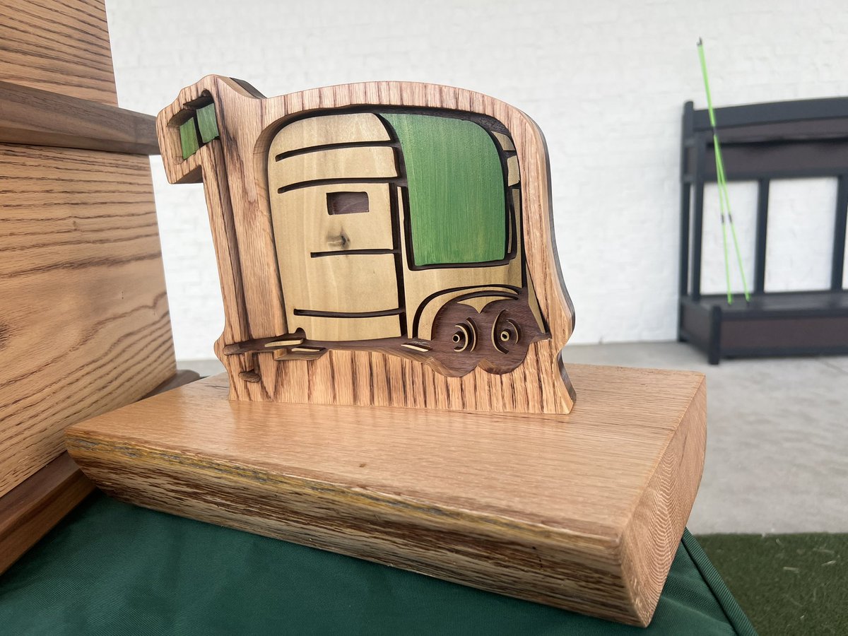 Oak tree slabs from the old driving range tee converted to Ashby (Member-Guest) trophies. Slabbed and then air dried for 3 years. 30 hours of lumber milling, planing, sanding and shaping to turn it all into these. One 60 lb. large perpetual trophy with 60 spaces for winners