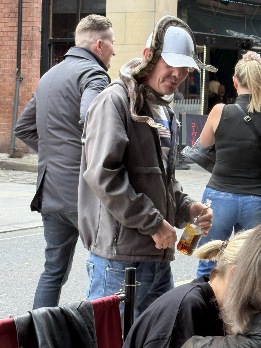 Normal for a night out in Leeds, UK - a python and a bottle of Newcastle Brown ale? I feel under dressed! 🐍❤️😎