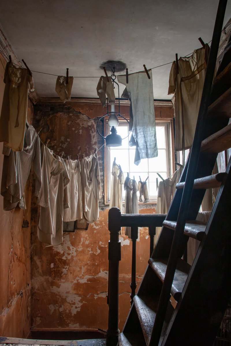 On summer days like this when the sky spits &amp; light barely enters the top landing, the servants sigh feeling the raindrops dripping from the wet laundry. They know of lands where the sun shines every day, but lack the time to imagine that landscape. There is work to be done.