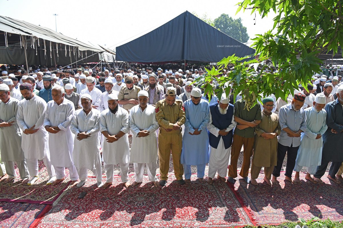 People offer Eid-ul-Adha prayers at Hazratbal shrine in Srinagar