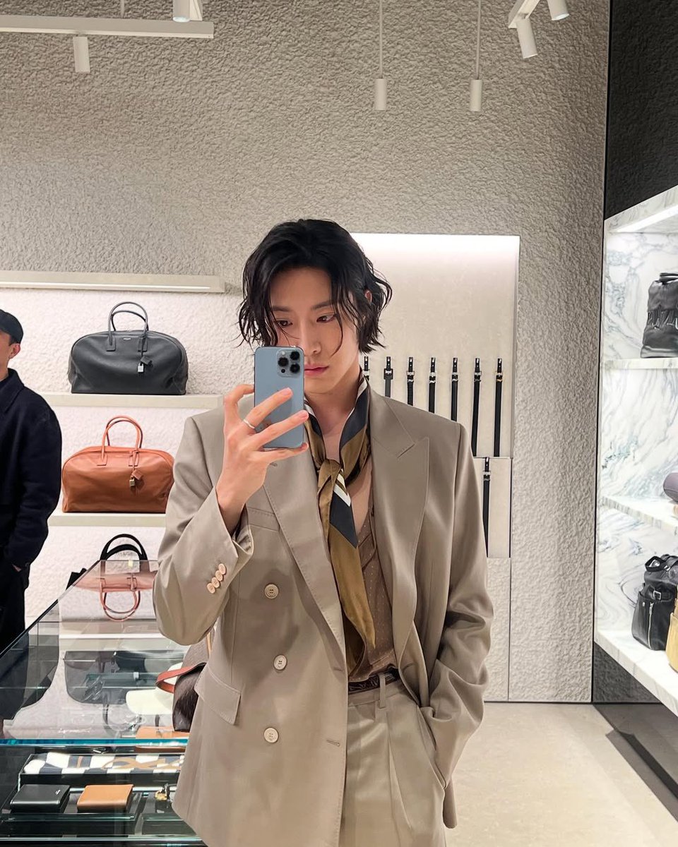 jongnow's tweet image. Draped in elegance, framed by YSL.