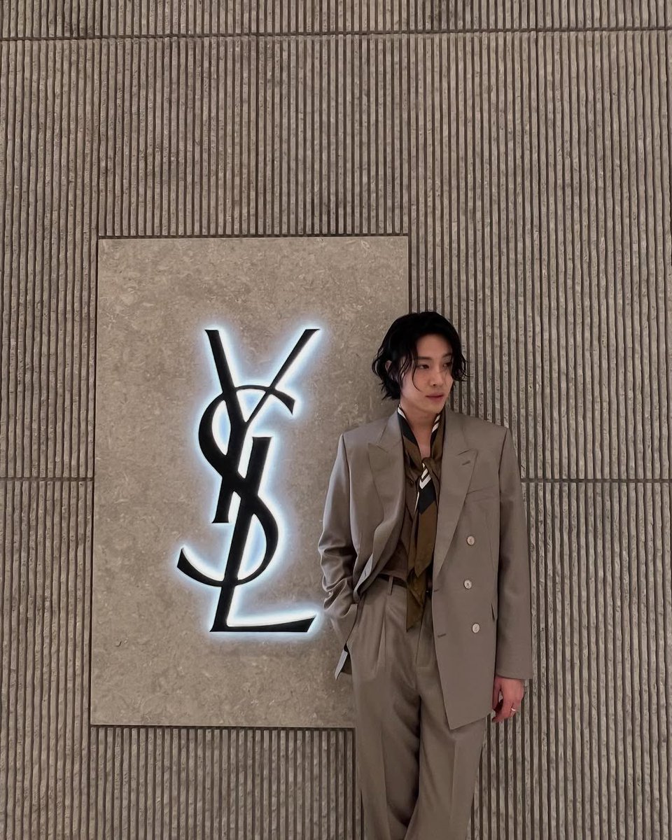 jongnow's tweet image. Draped in elegance, framed by YSL.