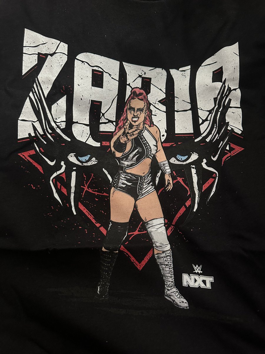 <a href="/ZariaWWE_/">ZARIA</a> as promised, i bought the shirt &amp; she is HERE! my new tuesday night uniform officially 🫡💜