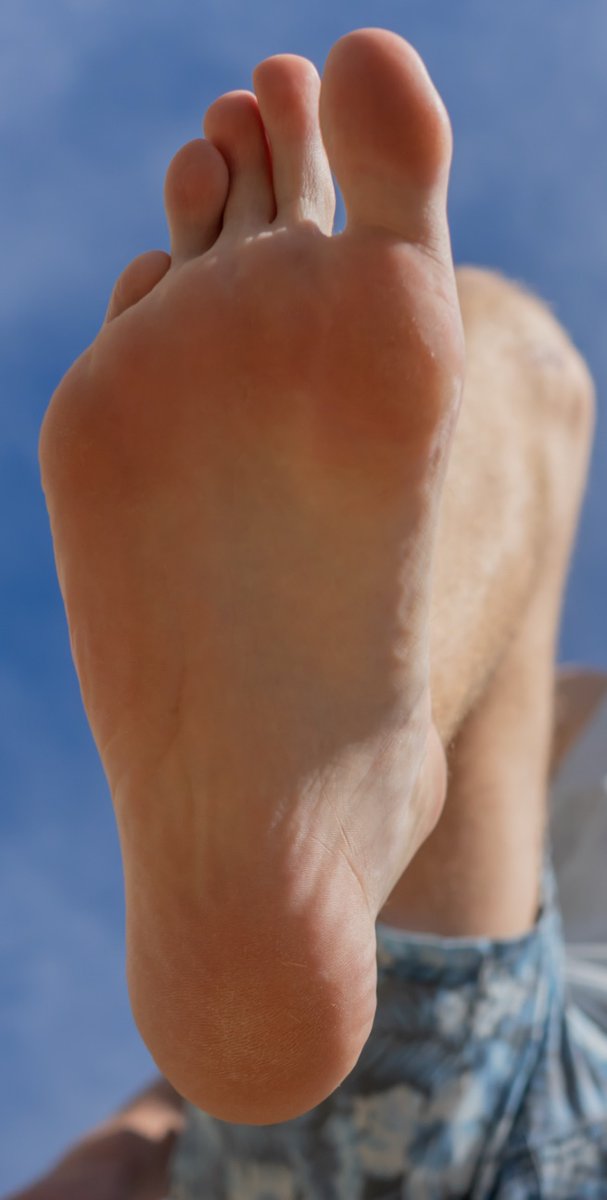 He was walking down the road to the beach barefoot when he saw one of the tiny Americans that shrunk. Casually the Aussie smiled as he lined his next footstep up with the future stain on his sole.