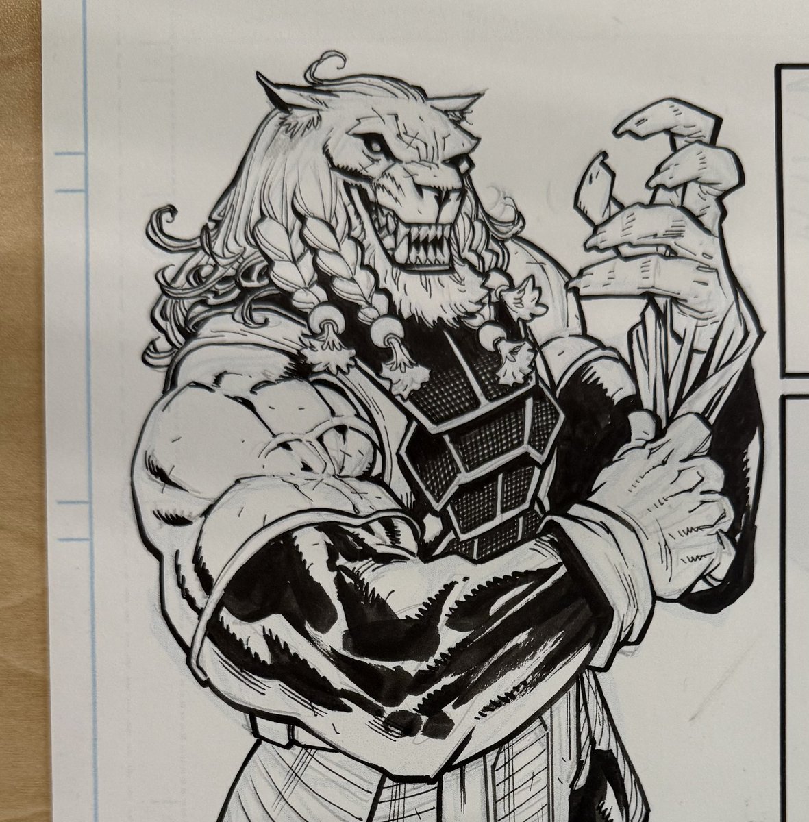 You won’t see this Battle Beast panel printed for a while, and since it doesn’t spoil anything, I figure I’ll show some basic process. I used to draw with blue pencil for the gesture/structure layout part, now I draw digital then print out in light blue, so it feels like blue