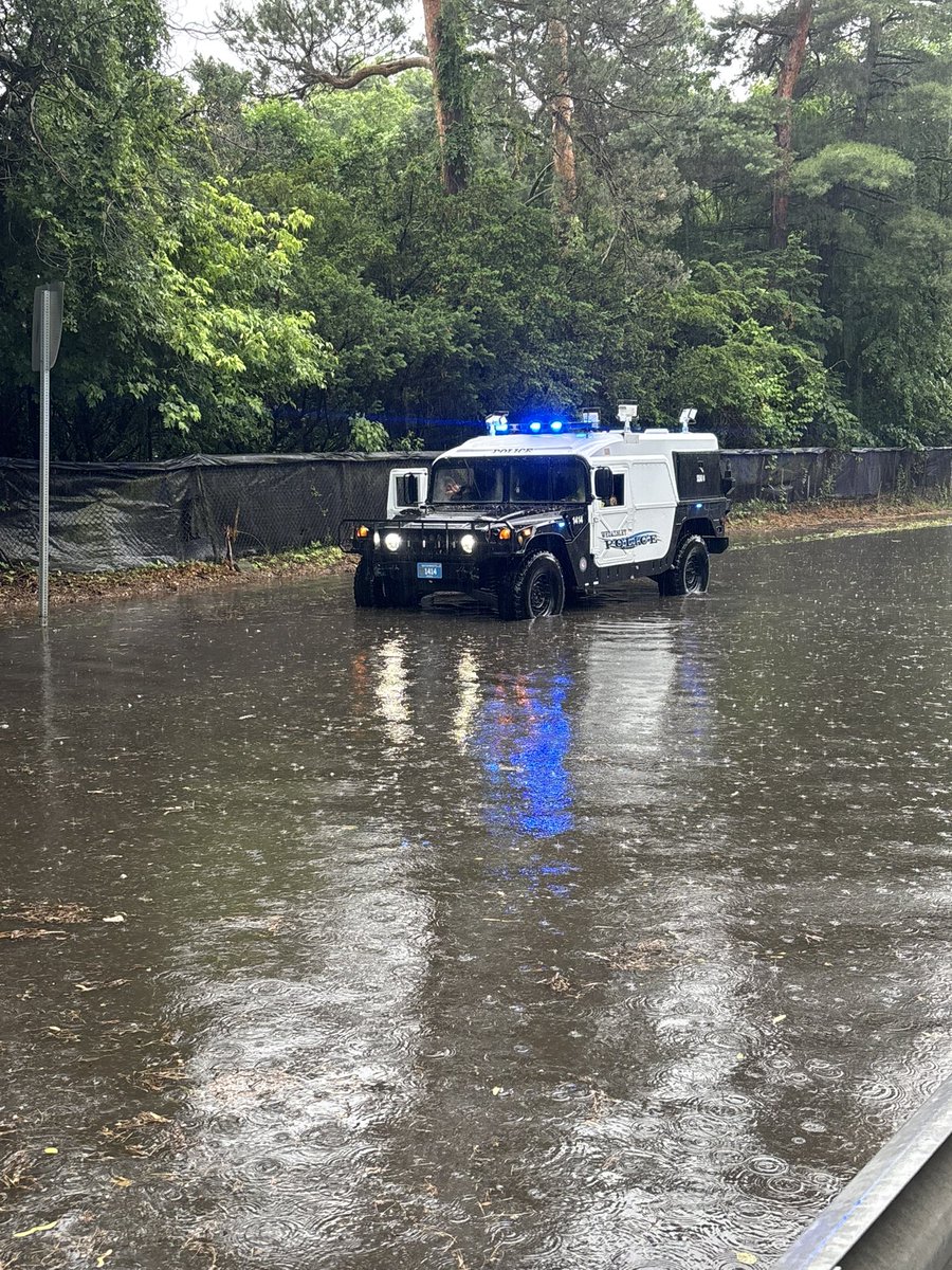 WellesleyPolice's tweet image. Update Route 9 East: Officers Chris Fritts and Stephen Gaffney are attempting to clear the storm drains to re open the road ahead of @MassDOT arrival. Officer Fritts reports from the scene “I don’t think the heavy stuff will be here for hours…”