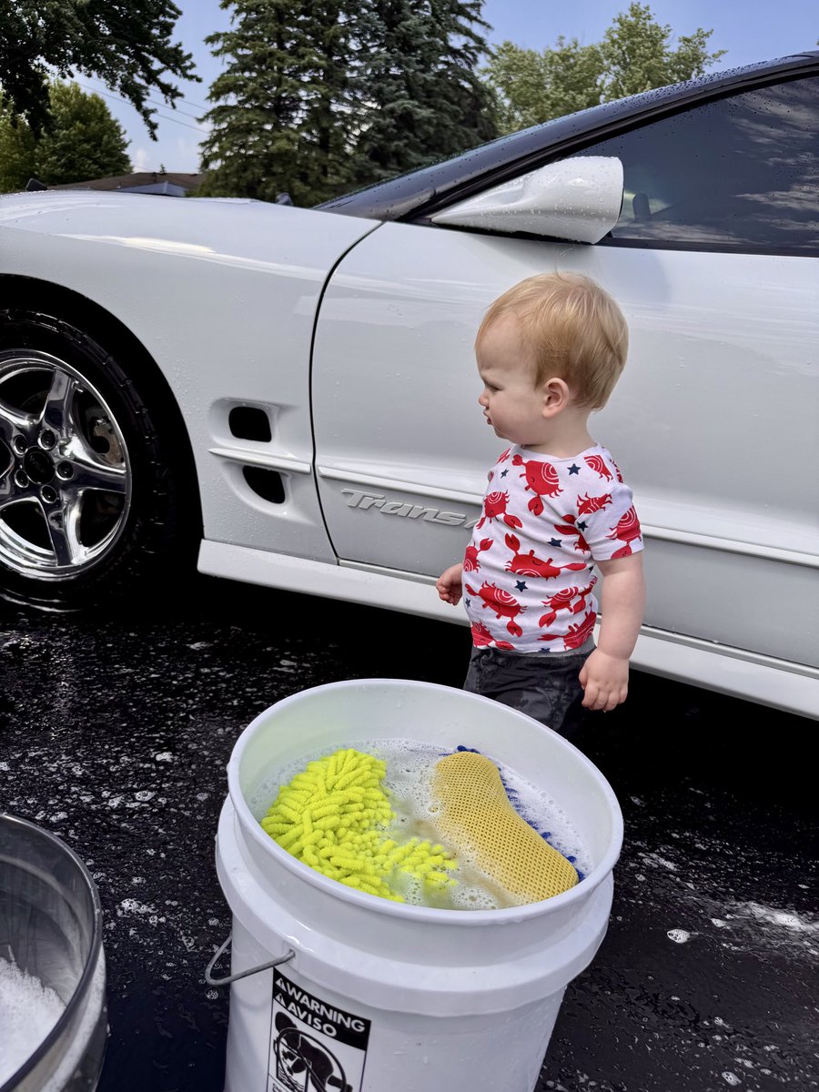 This kid is 0% helpful while washing this car. Keeps dropping the damn sponge, can’t control the house for crap, thinks you can dry while spraying. Can barely even speak.