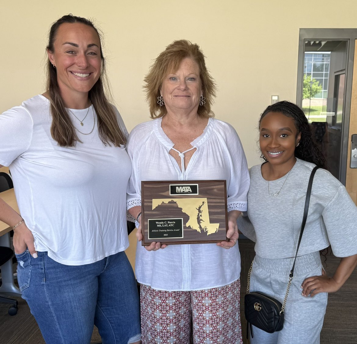Today at the Maryland Athletic Trainers' Association (MATA) Symposium our very own Wendy Norris was announced as the winner of the 2025 Athletic Training Service Award.  She is pictured here with DeMatha assistant ATs Jenn Reading and Rickee Yates.