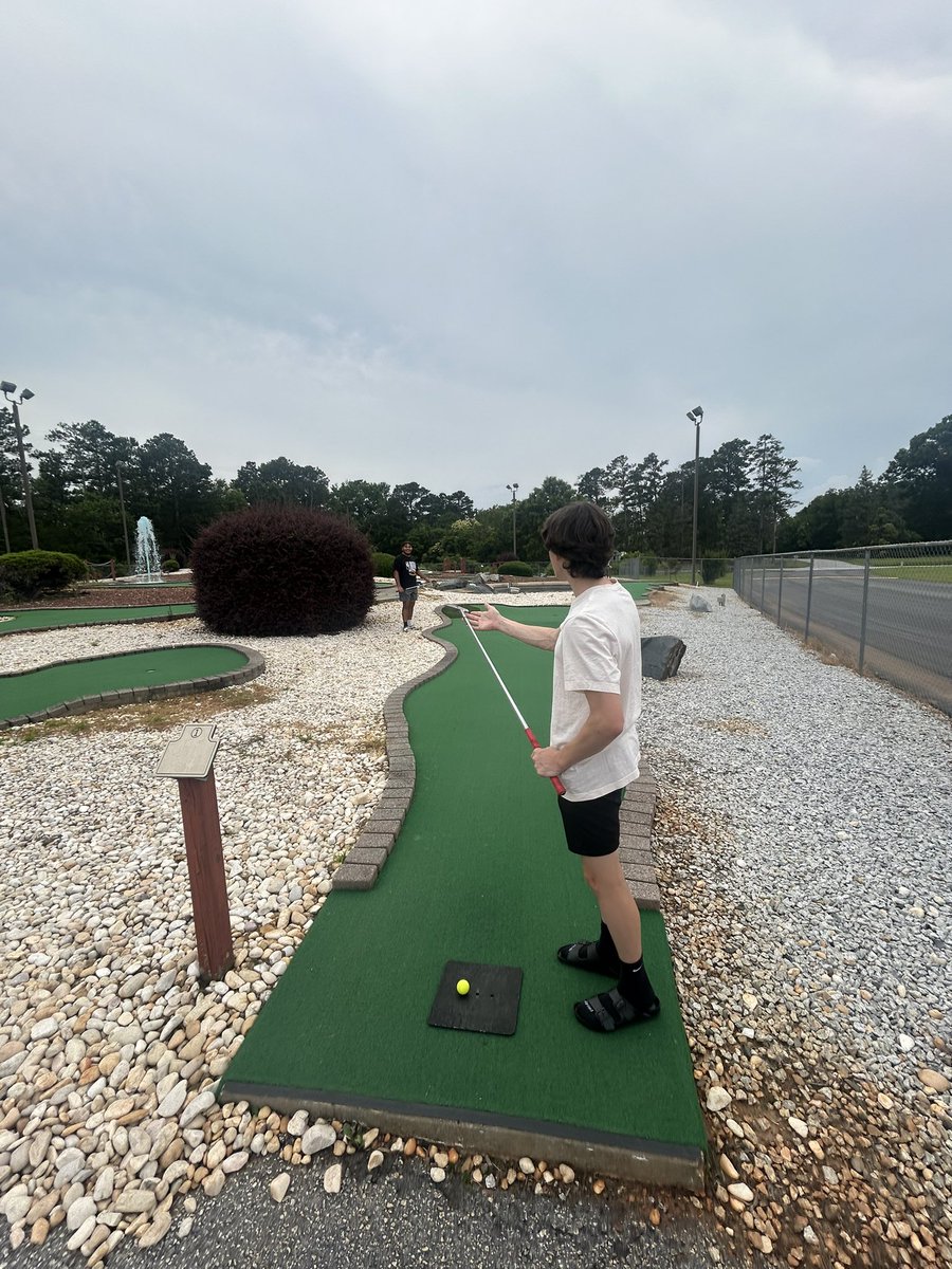 Mini golf at wrestling camp! Storms chased us off the course. Good for them - Landon and Jayden were going for course records.