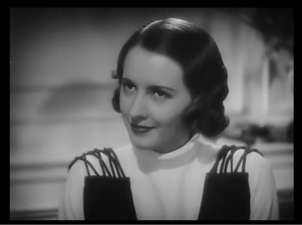 Love this idea of wearing a high-neck, long-sleeve top under an evening gown. Kudos to designer, Orry-Kelly. Barbara Stanwyck, Gambling Lady (1934).