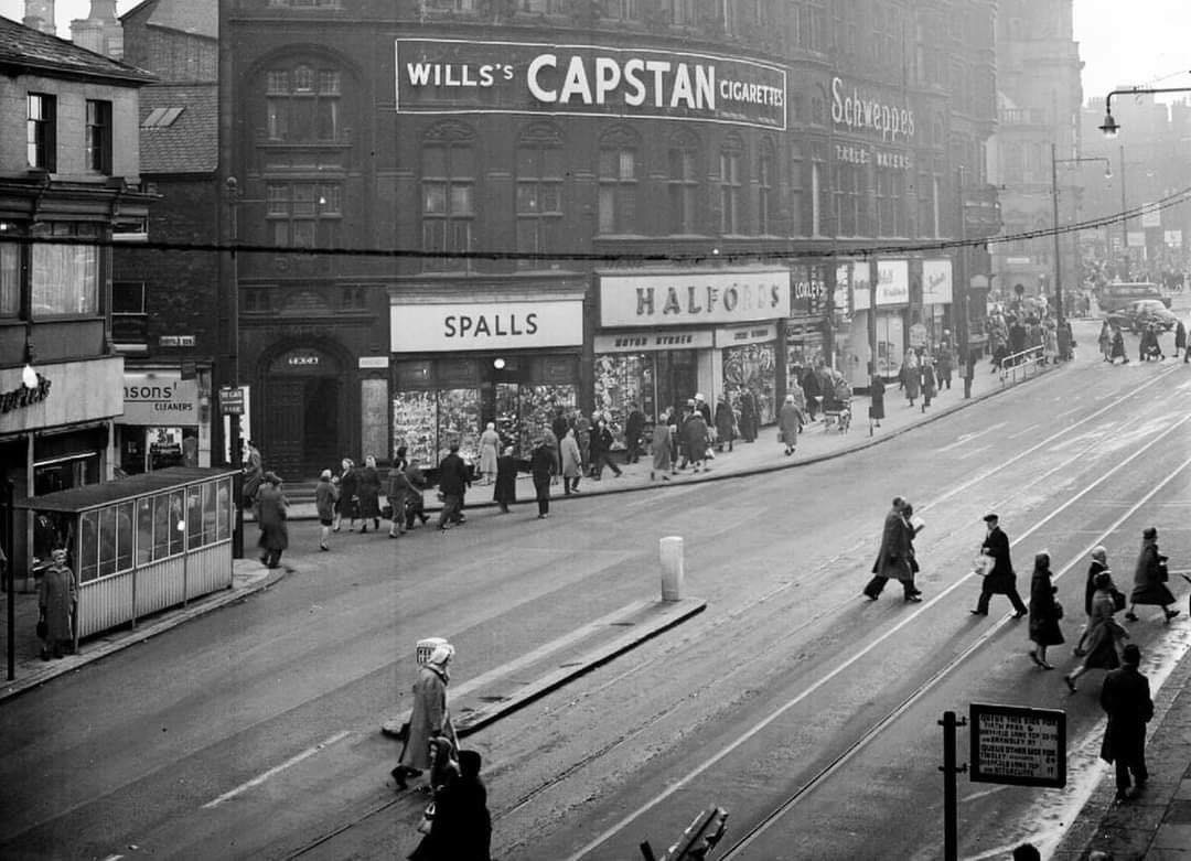 This is his things were before,shops , a bus shelter, less cars on the road