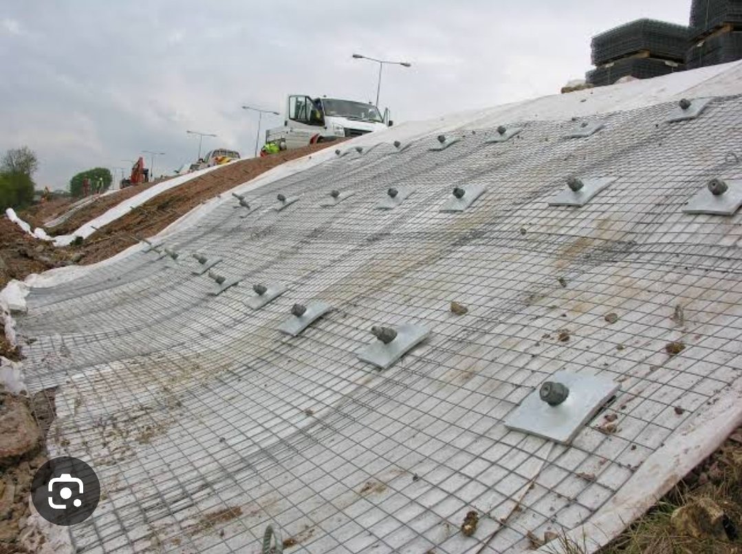 usmanisa__'s tweet photo. Soil nailing is a ground improvement technique that reinforces existing soil slopes or excavations using regularly spaced steel bars (nails) inserted into drilled holes and typically grouted. A facing, often shotcrete, is then applied to the slope. https://t.co/LGLWOqCcJo
