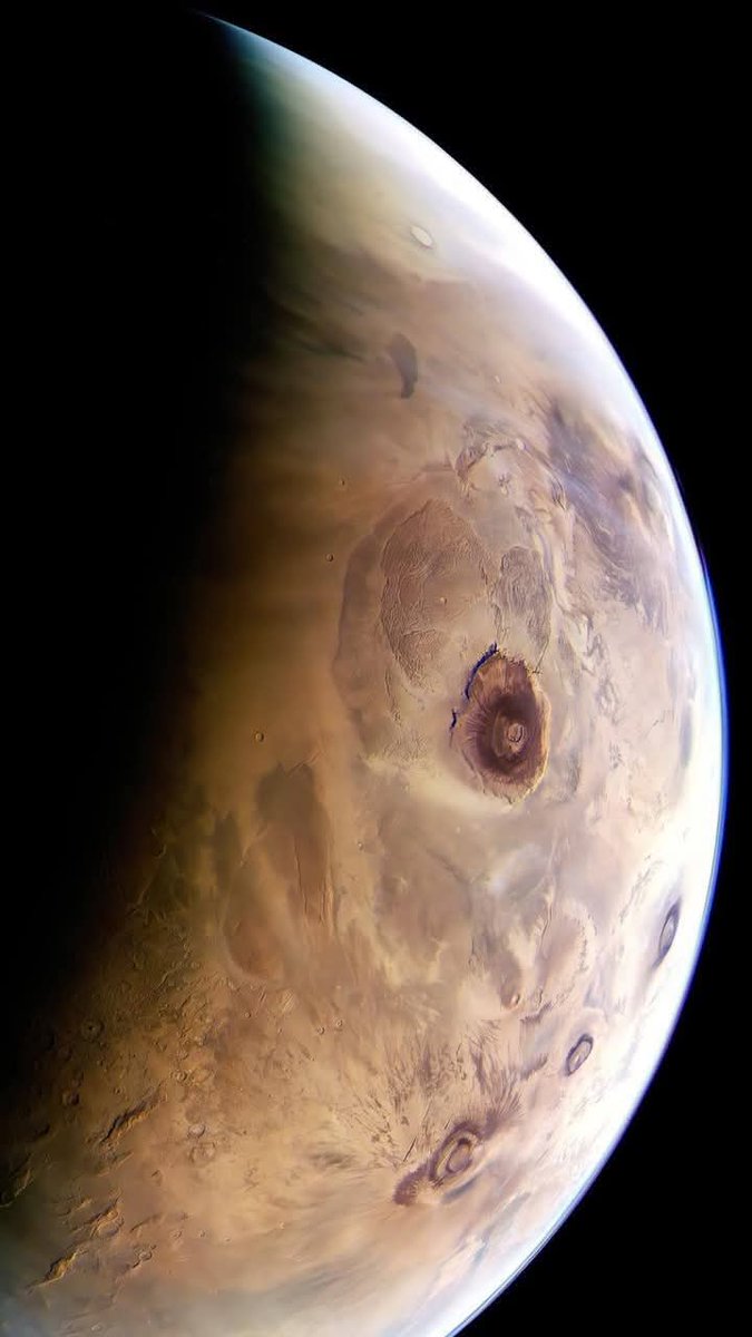 The tallest mountain in the solar system, Olympus Mons on Mars. It has a height of 25 km, Mount Everest is 'only' 8.8 km tall.
NASA