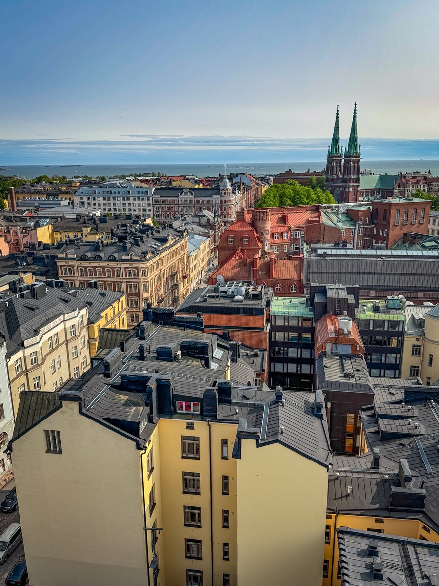 Kayryn's tweet photo. Above the rooftops of Helsinki. https://t.co/VgBQV7iaOG