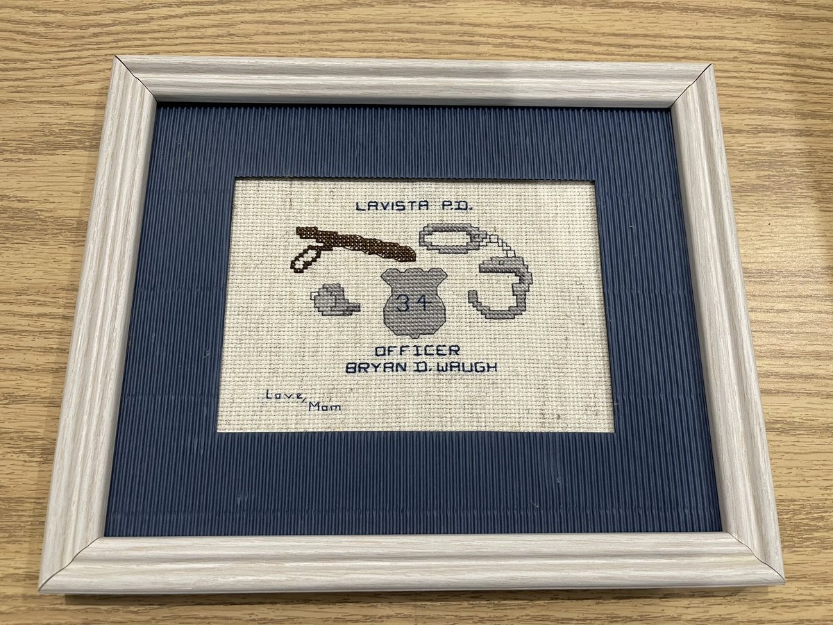 ColonelWaughNSP's tweet photo. I'm sorting through special things from my office as I settle in. This special piece was hand made by my MOM, March 27, 1998 when I graduated from the Nebraska Law Enforcement Training Center as a rookie @lavistapolice Officer.

Unfortunately, my mom never saw the opportunities to follow, a long career at LVPD, the honor to serve as the @KearneyPolice Chief and most recently, joining the @NEStatePatrol Team as Colonel-Superintendent. 

I’m certain she would be just as proud! I’m thankful for my mom and dad, they both formed my leadership style! Don't blink, take it all in. 💙