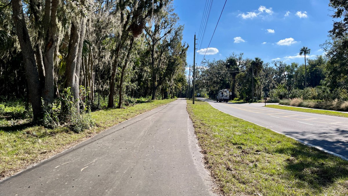 MyFDOT's tweet photo. National Trails Day may be over, but in case you missed the news: The @MyFDOT_CFL team recently completed a new 1.2-mile segment of the St. Johns River-to-Sea Loop along Myrtle Avenue in New Smyrna Beach! This 12-foot-wide asphalt multi-use trail improves safety and connectivity for pedestrians and bicyclists in the area. 

The Myrtle Avenue segment connects key local and regional trails, including the St. Johns River-to-Sea Loop and the East Coast Greenway, helping build a continuous trail system across multiple counties. Projects like this expand Florida’s trail network and promote even more transportation options for residents and visitors.
Learn more at https://t.co/eH9Ci7PY42