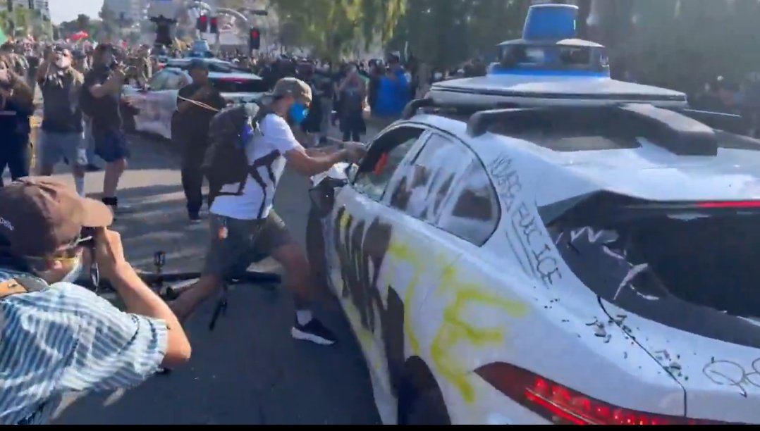 Schizointel's tweet photo. The Waymo Massacre of June 8th 2025 at least 4 brutally vandalized and destroyed https://t.co/sIkKEaYfOh