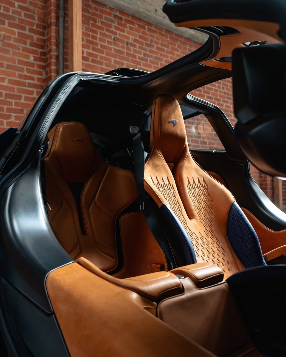 2020 McLaren Speedtail | One of just 106 produced! 🔥 

The exterior on this exquisite Speedtail is finished in 1k Bespoke Gloss Blue Tinted Visual Carbon Fiber along with a 1K Carbon Roof Scoop with Gloss Black Fade, Machined Aluminum and Platinum accents, MSO Heritage Badges,
