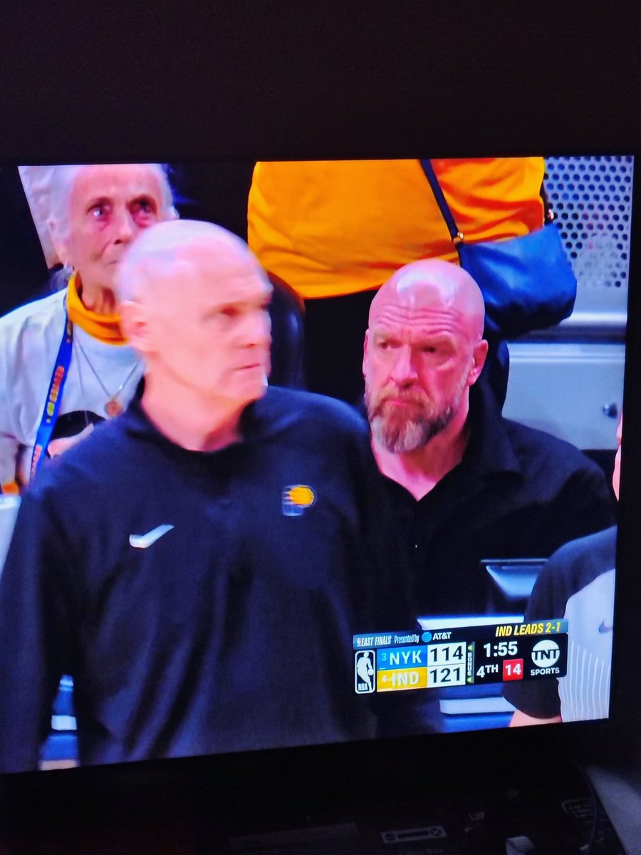 I didn't know <a href="/TripleH/">Triple H</a> watches basketball #INDvsNYK