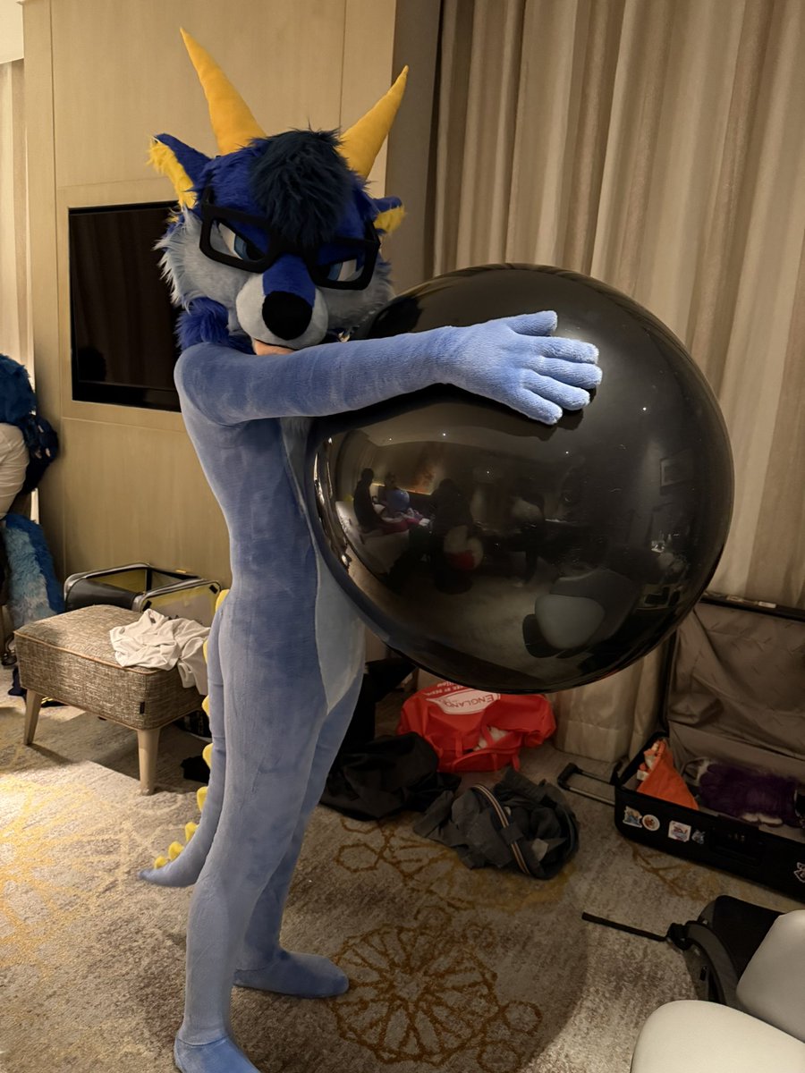 Slinky Xez with his suspiciously large black shiny balon