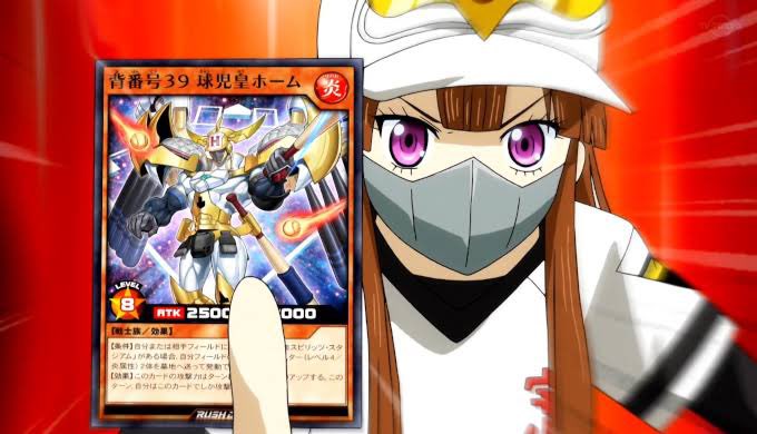 KotW94's tweet image. Yuka Goha es el personaje desbloqueable de Duel Links durante el mes de Junio.
El diálogo de la pista es dicho en el episodio 56 de YGO Sevens durante su duelo vs Romin cuando Yuka invoca a su as "Jugador 39".