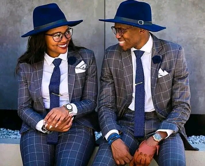 Checkd grey suits mached with white shirt the price range from 10k-30k depending on fabrick we are@Norwich building oppst Hilton Nrb cbd cell 0721539044