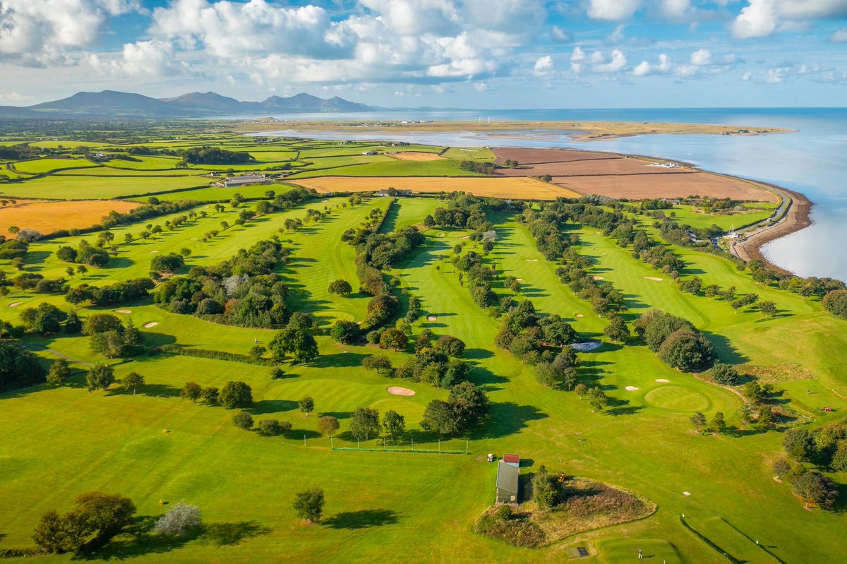 Golf with a castle in sight.

Mountains in the distance.

And locals who’ll show you the line on the green and the best pub after.

Caernarfon Golf Club = Proper golf in proper Wales.