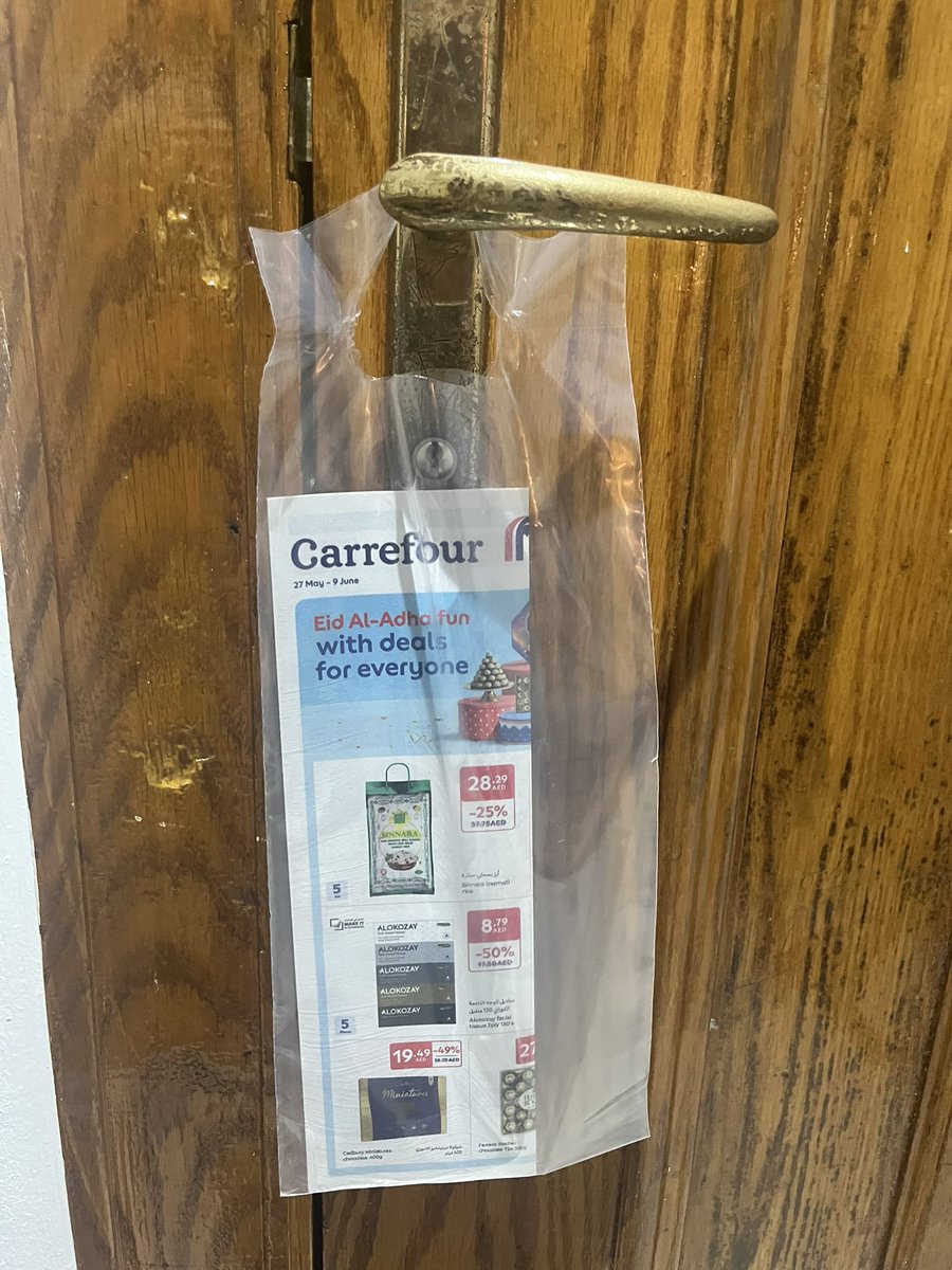 They started hanging ad flyers on our apartment doors… in individual plastic bags.