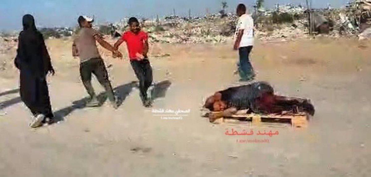 A Palestinian man is shot while getting aid—by israelis-or-American-mercenaries-same-same—&amp; retrieved by pallet #GazaDeathCamps